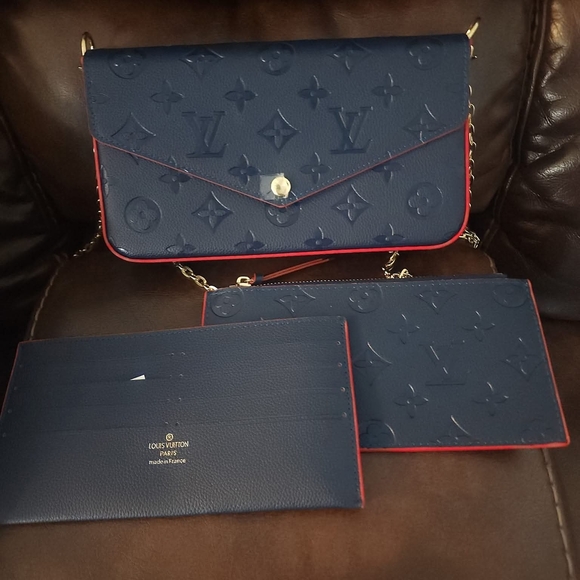 Louis Vuitton Blue and Red Embossed Clutch - Picture 1 of 1
